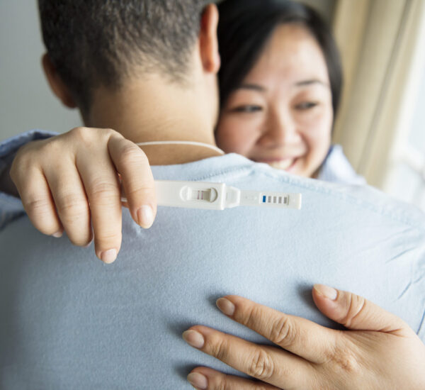 A couple happy about pregnancy test result